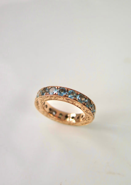 18ct Rose Gold Eternity Ring With Aquamarine