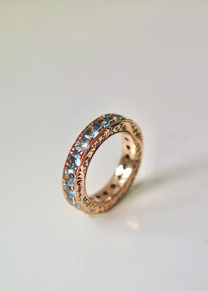 18ct Rose Gold Eternity Ring With Aquamarine